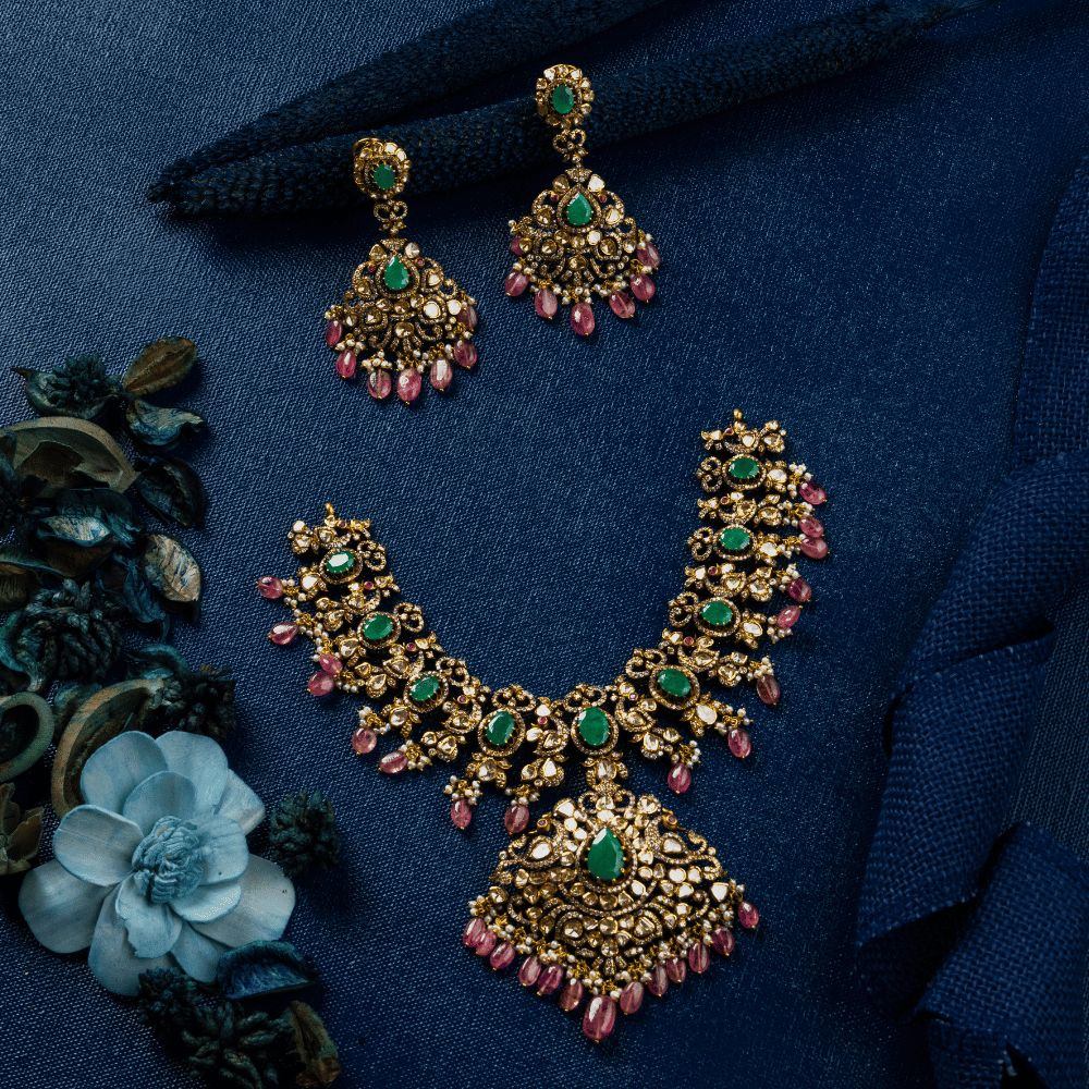 Flat Polki with Tourmaline Highlighted Neck set Flat Polki with Tourmaline Highlighted Neck set