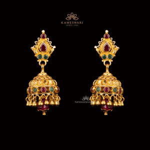 Gold Jhumkas with ruby, emerald accents, and intricate filigree.