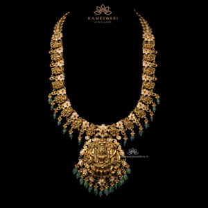 Luxurious Pachi Haram with Goddess Motif and Emerald Embellishments | Kameswari Jewellers