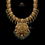 Luxurious Pachi Haram with Goddess Motif and Emerald Embellishments | Kameswari Jewellers