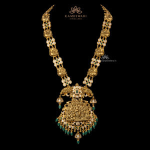 Majestic Pachi Haram with Goddess Motif and Emerald Accents | Kameswari Jewellers