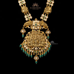 Majestic Pachi Haram with Goddess Motif and Emerald Accents | Kameswari Jewellers